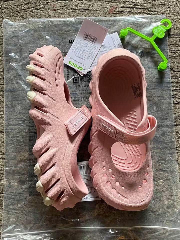 Crocs Echo Mary Jane Clog (Category: Flats & Sandals) located in Cebu City. Submitted by madeskartegirl (Listing ID 1468982780, Image 2). Description: - Brand new with tags in original plastic packaging and hangers - Style: Crocs Echo Mary Jane Clogs - Available colors: Neutral cream or soft pink - Features a unique sculpted design and chunky textured sole with cutouts - Adjustable strap across the top for a secure fit - 100% authentic and ready 