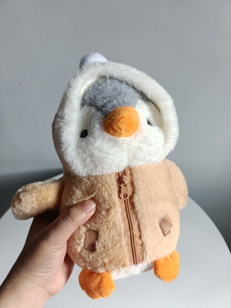 Cute Penguin Plush Toy in Winter Jacket (Category: Plushies & Soft Toys) located in Tanza. Submitted by misumei (Listing ID 1468987980, Image 2). Description: navideo lang and naitago na sa loob ng storage organizer..
