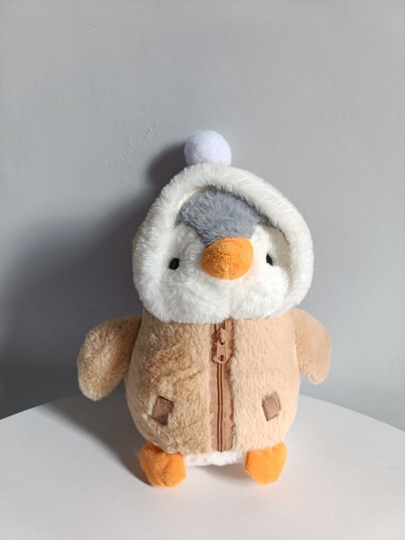 Cute Penguin Plush Toy in Winter Jacket (Category: Plushies & Soft Toys) located in Tanza. Submitted by misumei (Listing ID 1468987980, Image 1). Description: navideo lang and naitago na sa loob ng storage organizer..