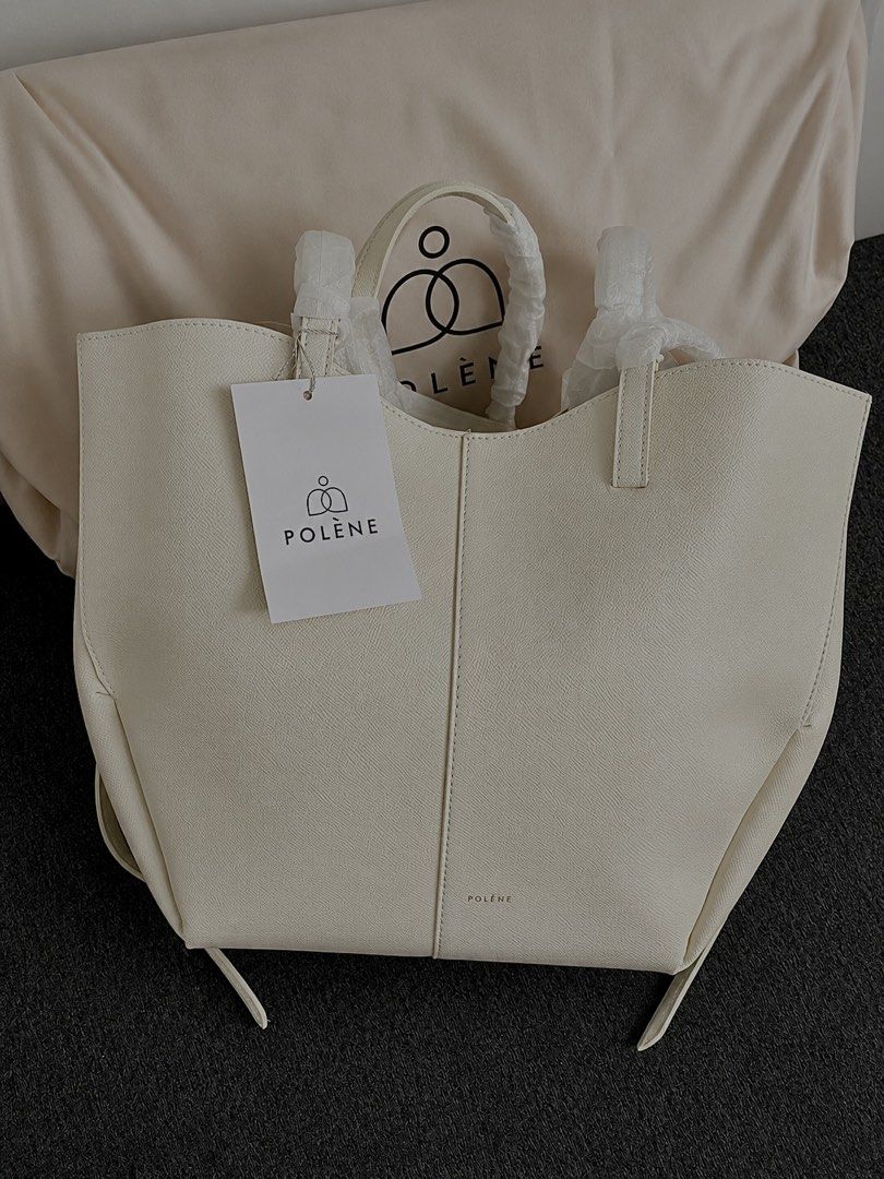 Cyme Bag (Category: Tote Bags) located in Muntinlupa City. Submitted by allychino (Listing ID 1469005003, Image 1). Description: P0LÈNÉ Cyme tote bag (Large@ - Color: Off-white - Material: Leather - Includes dust bag only - Handles still wrapped, indicating minimal to no use - Interior is clean - Ideal for everyday carry.