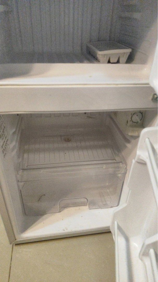 Daewoo Pastel Mint Two-Door Mini Refrigerator (Category: Refrigerators and Freezers) located in Manila. Submitted by imsoll (Listing ID 1468963771, Image 3). Description: - Brand: Daewoo mini fridge - Color: Aesthetic mint green - Design: Two-door setup (freezer on top, fridge below) - Inclusions: Comes with an ice cube tray - Best for: Small kitchens, dorm rooms, or offices - Condition: Works perfectly, ready for pickup.