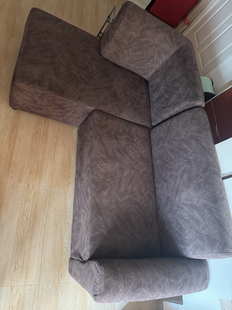 Dark Brown L-Shaped Sectional Sofa with Chaise (Category: Sofas) located in Makati City. Submitted by bell307 (Listing ID 1469012249, Image 3). Description: - Dark brown sectional sofa with convenient chaise lounge extension - Soft and durable microfiber/faux suede material with a textured finish - Deep seating and a comfortable armrest on one side for maximum relaxation - Space-saving design that fits nicely in any corner setup or living room la