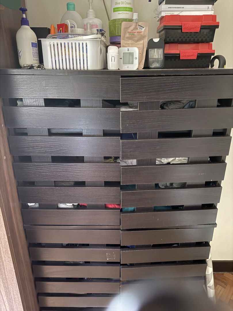 Dark Wood Storage Cabinet with Slatted Doors (Category: Shelves, Cabinets & Racks) located in Taguig. Submitted by tquila10 (Listing ID 1468941857, Image 1). Description: Selling my kids clothes cabinet Could be shoe cabinet Price is negotiable L- 30 inches W- 13 inches H - 50 inches RFS: Too small already for their clothes Very good condition Your own pickup - Color/Material: Dark brown solid wood - Design: Stylish front slatted doors with multi
