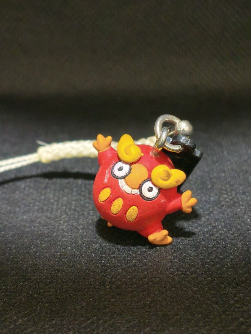 Darumaka mini strap keychain (Category: Kids Toys) located in Pasig City. Submitted by knick_n_knacks (Listing ID 1469041654, Image 1). Description: Condition and other details: This item is pre-loved. There are very visible scuffs, scratches, paint chips on the face area. PLEASE REFRAIN FROM PURCHASING IF THESE CONDITIONS ARE A CONCERN. 📌 **READ THIS CAREFULLY BEFORE BUYING.** WYSIWYG. Photos posted are the actual item—please inspect carefully 