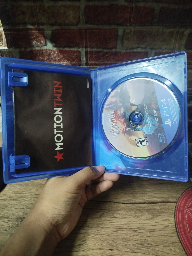 Dead Cells PS4 Game (Category: PlayStation) located in Binan City. Submitted by pumpkiiin02 (Listing ID 1468990424, Image 3). Description: - Title: Dead Cells for PlayStation 4 - Genre: Action platformer / Roguelike - Included: Original case, cover art, game disc, and insert booklet - Condition: Disc is clean and plays flawlessly; case has minor shelf wear on the plastic wrap - Ideal for: Gamers looking for challenging action and exploration.