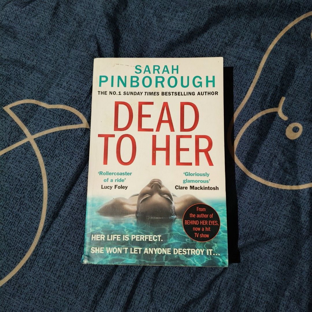 Dead to Her by Sarah Pinborough (Category: Storybooks) located in Santo Domingo. Submitted by rajjinni (Listing ID 1469060415, Image 1). Description: - Title: Dead to Her by Sarah Pinborough - Genre: Psychological thriller / Mystery - Plot: Dark secrets and betrayal in an affluent community - Format: Paperback - Condition: Good; minor shelf wear on edges and natural page yellowing from age - Perfect for: A fast-paced weekend read.