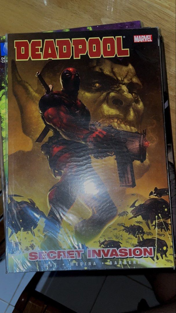 Deadpool Secret Invasion Marvel Comic Book (Category: Comics & Manga) located in Manila. Submitted by andreslvdr (Listing ID 1469099011, Image 1). Description: - Title: Marvel Deadpool Secret Invasion Trade Paperback Comic Book - Creators: Written by Way, Medina, and Barberi - Condition: Excellent, kept inside a protective plastic sleeve - Cover Art: Features Deadpool with a Skrull face in the background - Perfect for: Marvel collectors and Deadp
