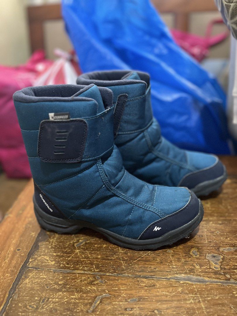 Decathlon Quechua Winter Boots (Category: Boots) located in Quezon City. Submitted by rhoyrhoy (Listing ID 1468978997, Image 1). Description: Decathlon Quechua Brand Winter boots Aqua blue with black trim colors Comfortable for walking and snow activities Water resistant Best fits size 7 Perfect snug fit worn with socks Minor flaw: glue is starting to strip due to storage and no longer being used. You can just apply shoe/cobbler super glue or hav