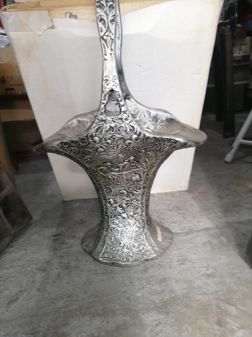 Decorative vase (Category: Everything Else Others) located in Paranaque City. Submitted by jhedplus (Listing ID 1469084107, Image 1). Description: Silvered color metal looks like cast aluminum Please read! For sure buyer only! NO COD/COP No reservation The items will be sold to the first payer w/o prior notice. Verbal reservations are not acceptable. Note: All items are vintage. Please manage your expectations accordingly. G cash payment. Shippin