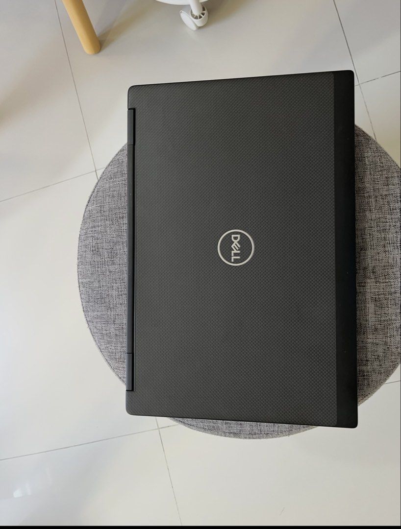 Dell Precision 7530 Mobile Workstation Laptop (Category: Laptops & Notebooks) located in Muntinlupa City. Submitted by bmati (Listing ID 1469112565, Image 1). Description: - Model: Dell Precision 7530 Mobile Workstation - Design: Black carbon fiber lid, clean body with intact ports and sturdy hinge - Keyboard: Full-size with dedicated numeric keypad - Ports: Multiple USB-C Thunderbolt ports and SD card reader - Performance: Heavy-duty machine bui