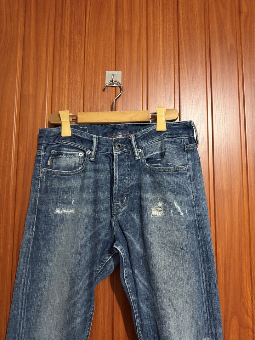 Denim & Supply Ralph Lauren Distressed Jeans (Category: Jeans) located in Manila. Submitted by tlfph (Listing ID 1469028717, Image 2). Description: - Brand: Denim & Supply Ralph Lauren - Wash: Classic mid-blue with natural fading - Details: Factory-distressed finish, whiskering, and subtle knee fading - Closure: Classic button fly - Special Feature: Distinctive American flag patch on the back right pocket - Material: Sturdy, durable denim constru