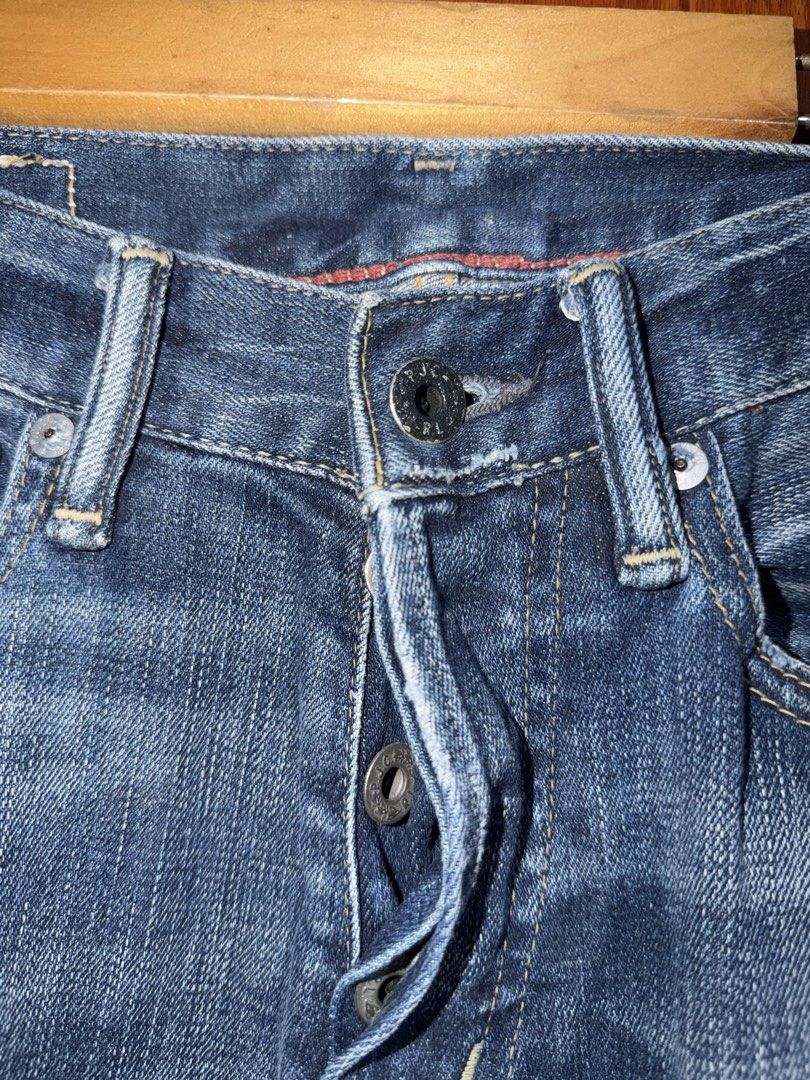 Denim & Supply Ralph Lauren Distressed Jeans (Category: Jeans) located in Manila. Submitted by tlfph (Listing ID 1469028717, Image 3). Description: - Brand: Denim & Supply Ralph Lauren - Wash: Classic mid-blue with natural fading - Details: Factory-distressed finish, whiskering, and subtle knee fading - Closure: Classic button fly - Special Feature: Distinctive American flag patch on the back right pocket - Material: Sturdy, durable denim constru