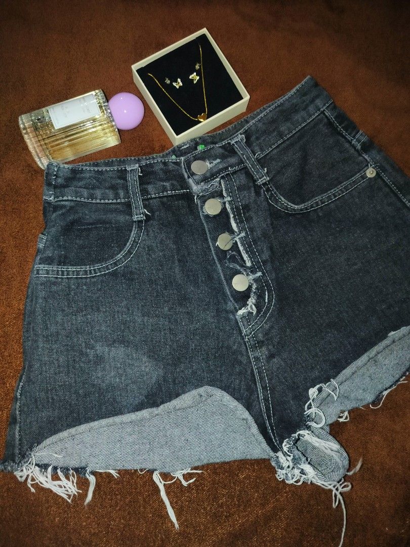 Denim shorts with raw hem and text graphic (Category: Shorts) located in Las Pinas. Submitted by alkwinuts (Listing ID 1469159856, Image 1). Description: - Style: High-waisted black washed denim shorts with an edgy vibe - Closure: Classic button fly - Details: Raw frayed hems and back pocket graphic text reading 'I want your mouth on my body right now.' - Pockets: Functional front and back pockets - Versatility: Great for casual day wear or styli