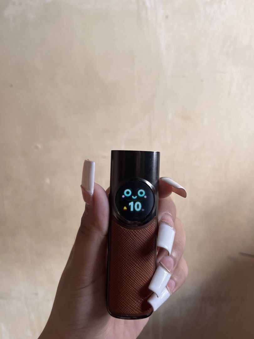 Device Max Double Flavor Vape Brown (Category: Everything Else Others) located in Marikina City. Submitted by mikaelabeltran (Listing ID 1468932238, Image 2). Description: - Device: Device Max in Brown (Clean unit, tested & working) - Features: Double flavor & double lifespan - Display: Screen lights up with cute graphics when powered on - Design: Textured body grip with a sleek top finish - Inclusion: Original box included.