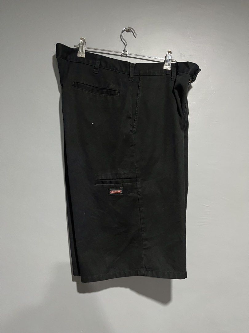 Dickies Black Work Shorts (Category: Shorts) located in Maasin. Submitted by niconii090 (Listing ID 1468985547, Image 3). Description: - Brand: Dickies - Color: Classic Black - Material: Sturdy, durable cotton blend for daily wear - Pockets: Multiple utility pockets for small tools - Details: Woven Dickies logo patch near the hem - Fit/Closure: Belt loops with secure button and zip fly closure -📏 W 35 | L 24 | LEG OPENING 13.
