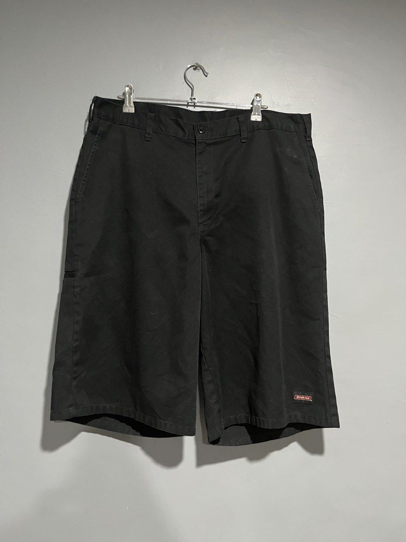 Dickies Black Work Shorts (Category: Shorts) located in Maasin. Submitted by niconii090 (Listing ID 1468985547, Image 1). Description: - Brand: Dickies - Color: Classic Black - Material: Sturdy, durable cotton blend for daily wear - Pockets: Multiple utility pockets for small tools - Details: Woven Dickies logo patch near the hem - Fit/Closure: Belt loops with secure button and zip fly closure -📏 W 35 | L 24 | LEG OPENING 13.