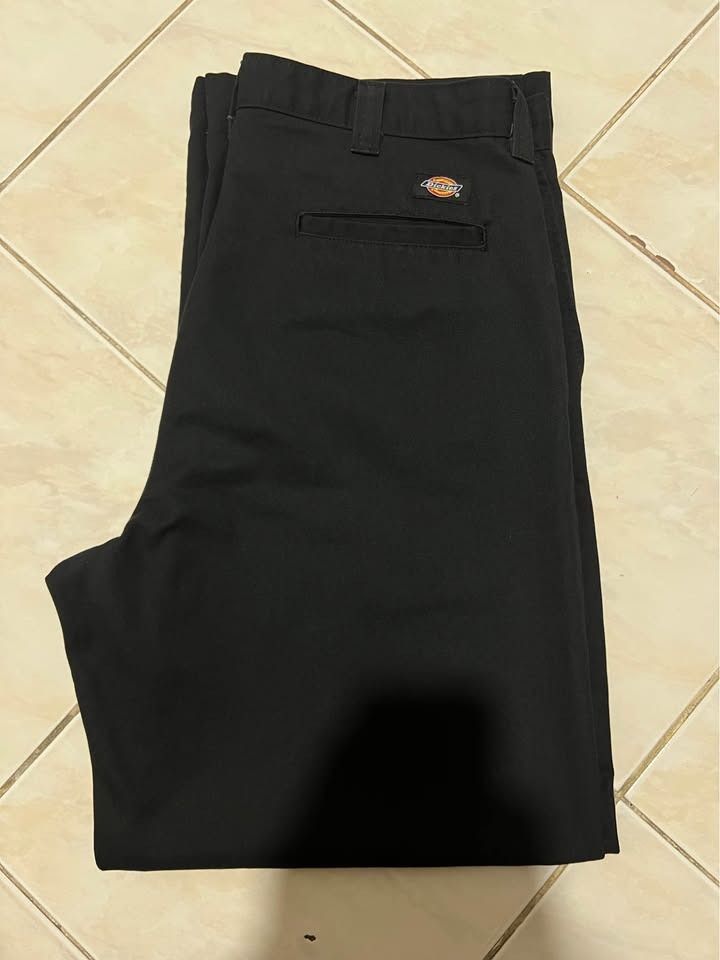 Dickies Straight Cut Pants (Category: Trousers) located in Caloocan City. Submitted by iamsyx (Listing ID 1468952034, Image 3). Description: - Brand: Dickies Occupational Wear - Color: Black - Fit: Straight leg cut - Details: Standard belt loops, rear welt pockets, woven brand patch - Condition: Clean, minimal wear, Crispy Condition, No issue - Style: Classic streetwear staple.