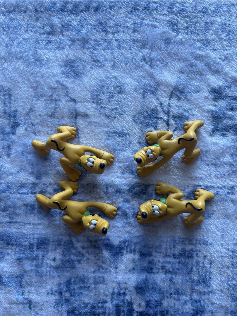 Disney Pluto mini PVC (Category: Figurines & Statues) located in Baguio. Submitted by nextchapter.ph (Listing ID 1468936549, Image 1). Description: Pluto miniature figures! 75 each , take all for only 250.00.
