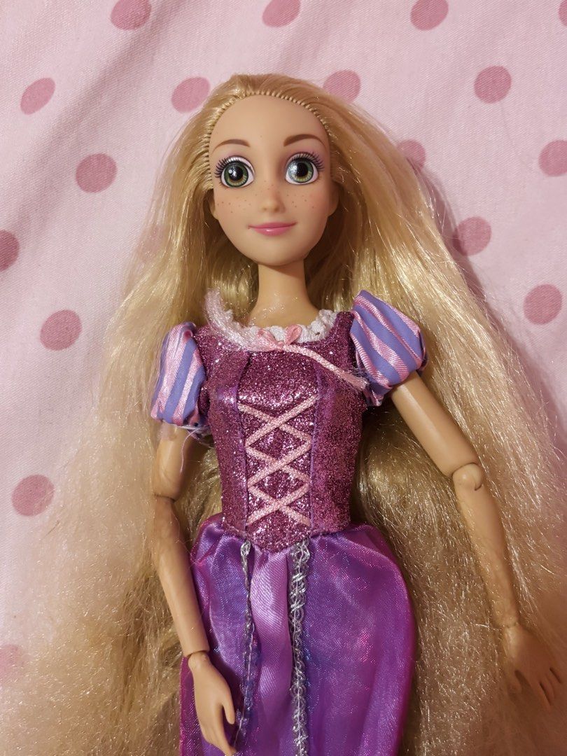 Disney Store Rapunzel doll (Category: Kids Toys) located in Legazpi City. Submitted by pink_moonlight (Listing ID 1469037840, Image 1). Description: Hair needs work..
