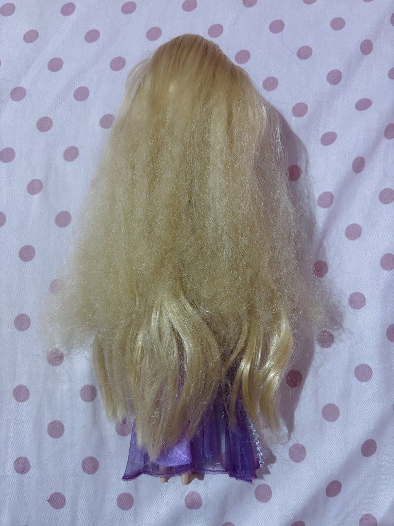 Disney Store Rapunzel doll (Category: Kids Toys) located in Legazpi City. Submitted by pink_moonlight (Listing ID 1469037840, Image 3). Description: Hair needs work..