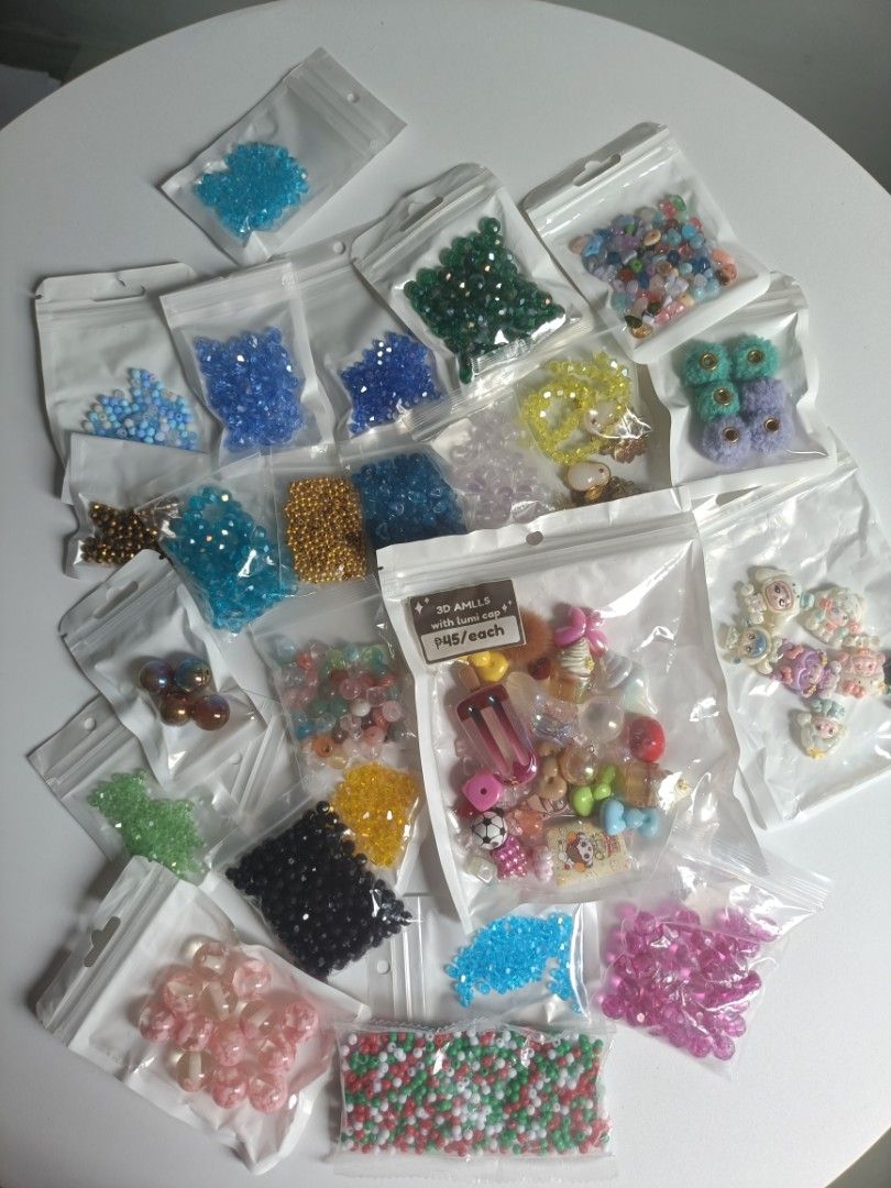 DIY Craft Beads and Charms Variety Pack (Category: Craft Supplies & Tools) located in Tanza. Submitted by misumei (Listing ID 1468983446, Image 1). Description: take all only **glass yung mga crystal except sa black and mixed blue. **may hole lahat pati yung mga flatback and charms. .