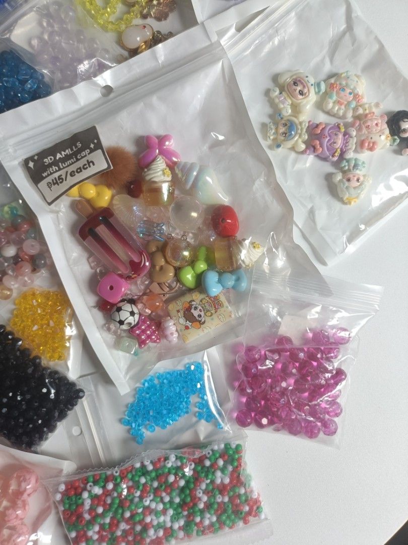 DIY Craft Beads and Charms Variety Pack (Category: Craft Supplies & Tools) located in Tanza. Submitted by misumei (Listing ID 1468983446, Image 2). Description: take all only **glass yung mga crystal except sa black and mixed blue. **may hole lahat pati yung mga flatback and charms. .