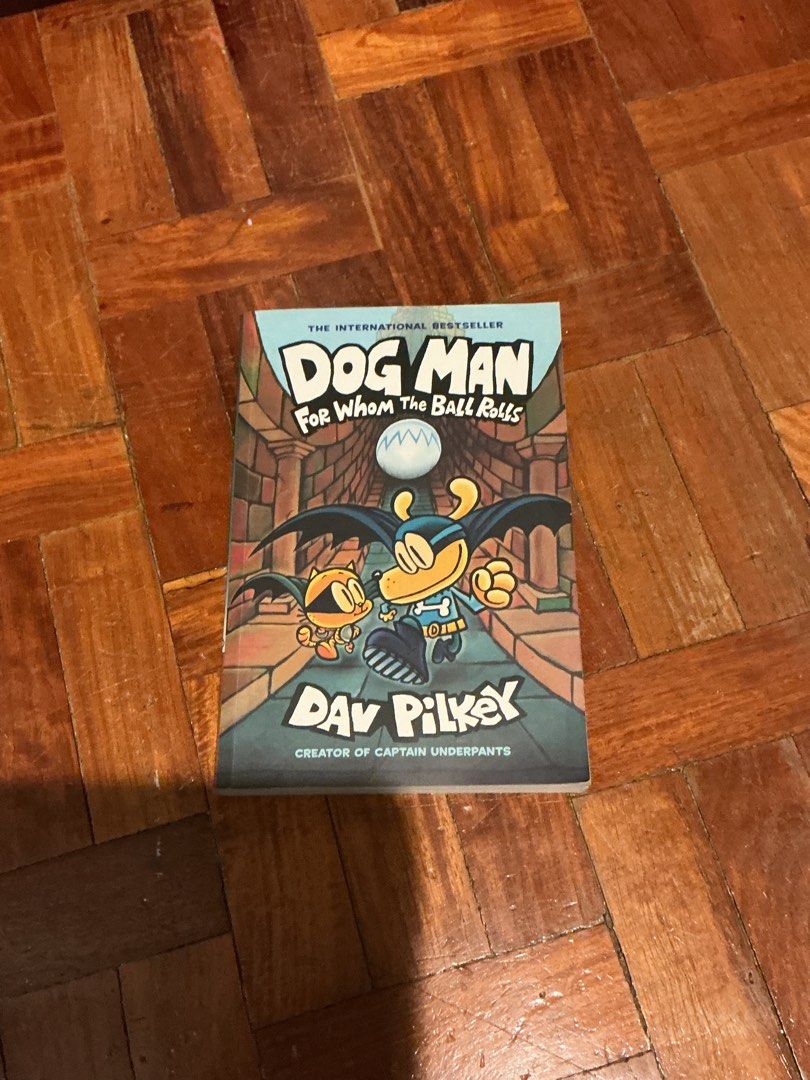 Dog Man: For Whom the Ball Rolls (Category: Children's Books) located in Muntinlupa City. Submitted by antonrizz (Listing ID 1469034947, Image 1). Description: - Title: Dog Man Book 7 - Author: Dav Pilkey (Creator of Captain Underpants) - Publisher: Scholastic Graphix - Perfect for: Kids and young readers looking for a fun graphic novel.