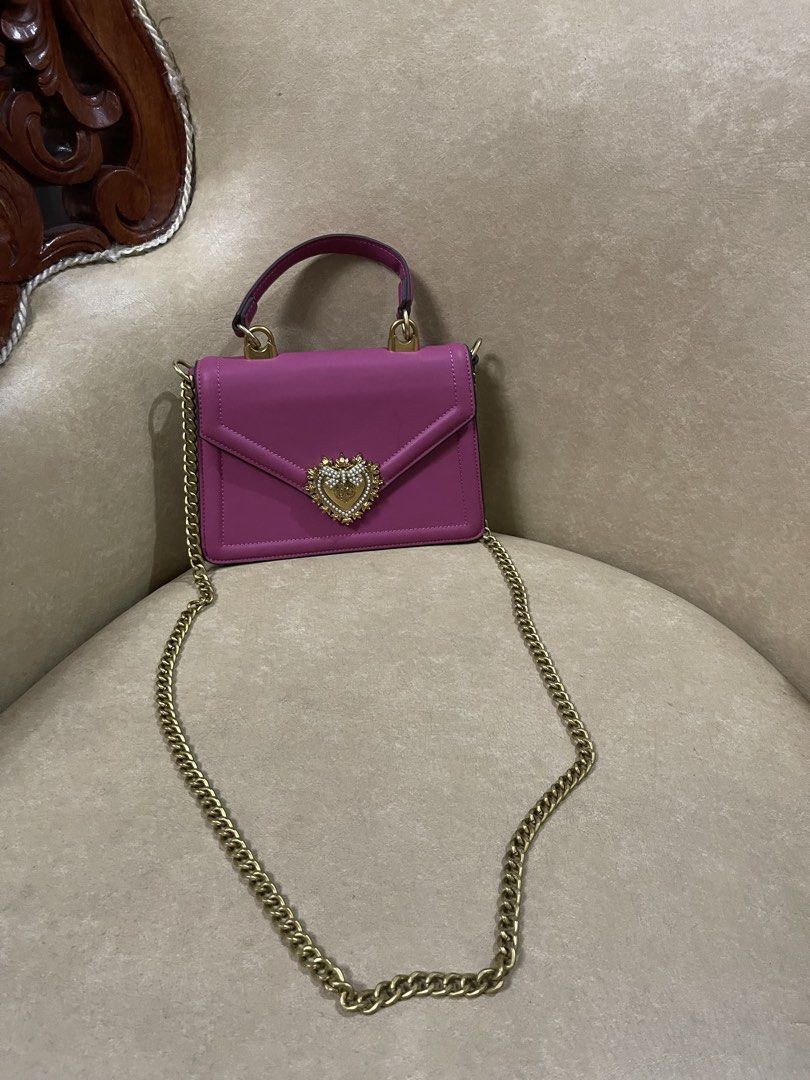 Dolce and Gabbana Devotion Top Handle Bag (Category: Luxury Bags & Wallets) located in San Jacinto. Submitted by lovedbylou.ph (Listing ID 1469090559, Image 2). Description: •vibrant fuchsia/dark pink calfskin leather •negotiable.