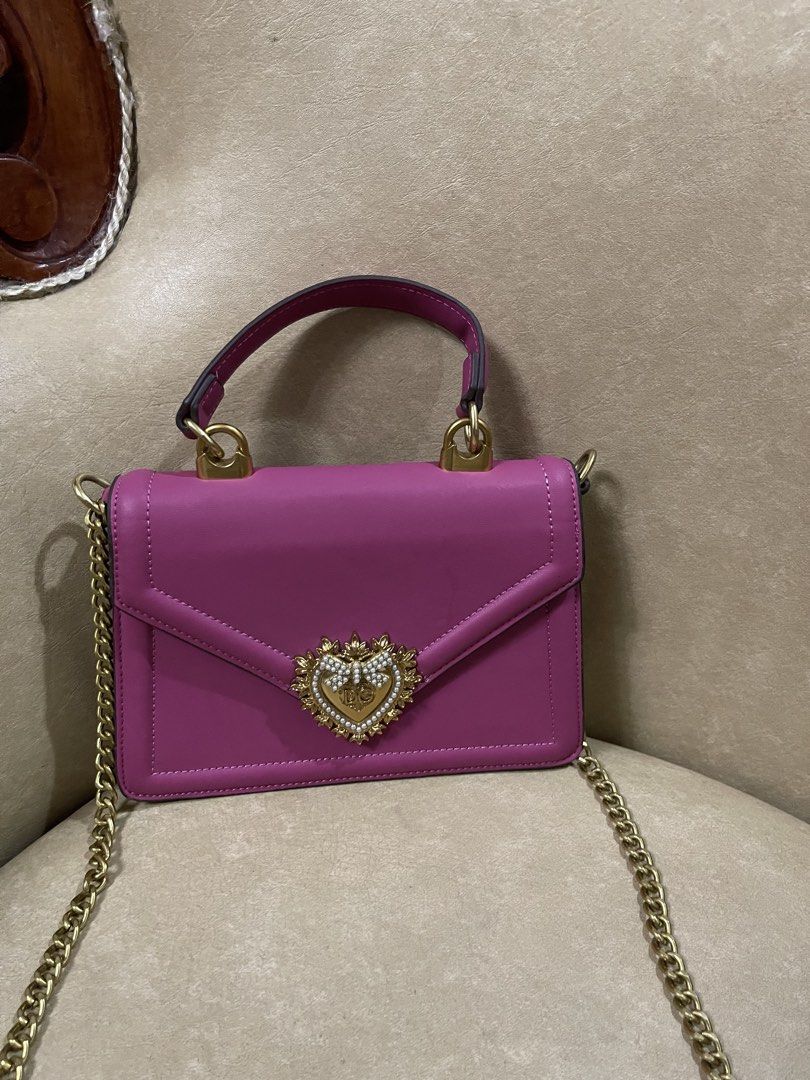 Dolce and Gabbana Devotion Top Handle Bag (Category: Luxury Bags & Wallets) located in San Jacinto. Submitted by lovedbylou.ph (Listing ID 1469090559, Image 1). Description: •vibrant fuchsia/dark pink calfskin leather •negotiable.