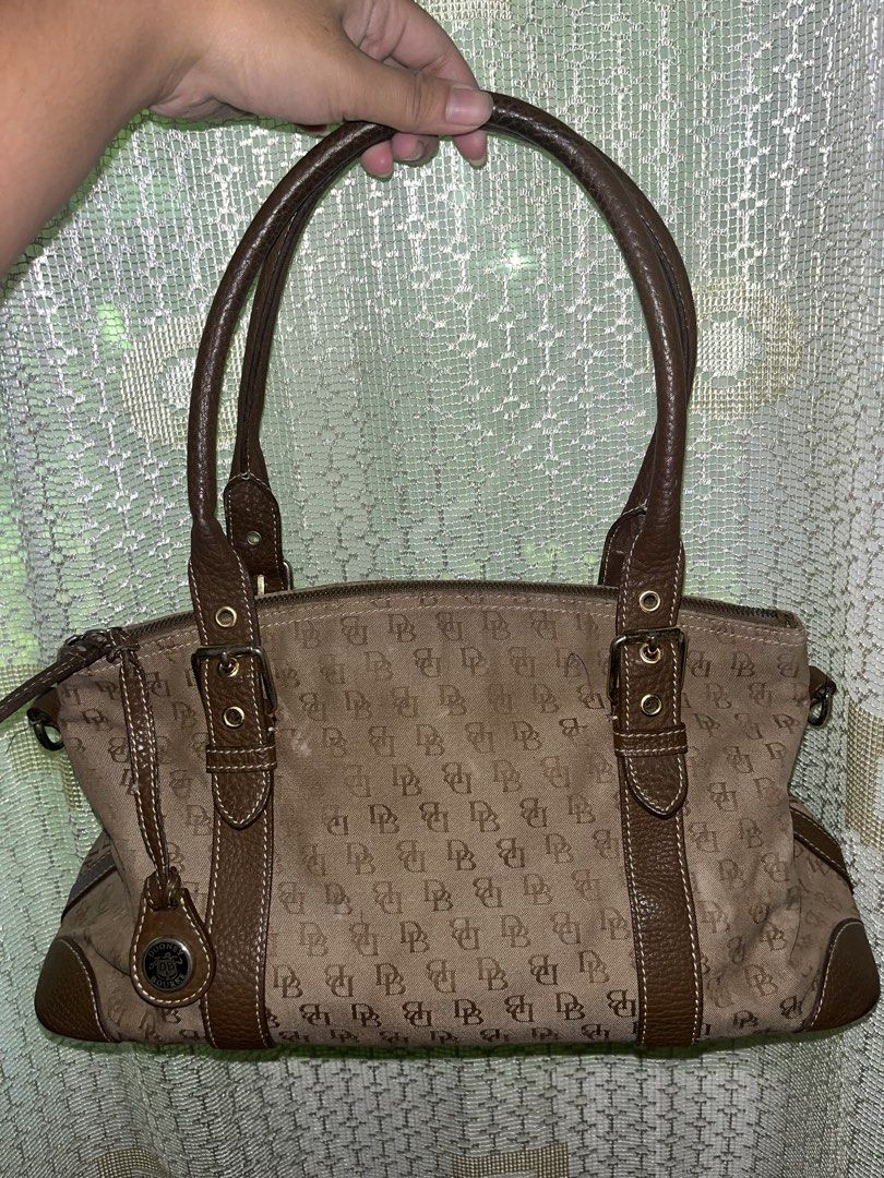 Dooney & Bourke Monogram Brown Handbag (Category: Luxury Bags & Wallets) located in Vintar. Submitted by layla.ly (Listing ID 1468973587, Image 2). Description: - Authentic Dooney & Bourke monogram canvas handbag in classic brown MOP: GCASH/GOTYME MOD: JNT only Shipping fee will be shouldered by the buyer.
