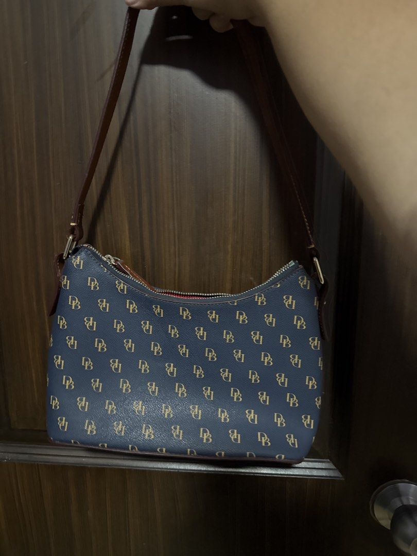 Dooney & Bourke Navy Monogram Shoulder Bag (Category: Luxury Bags & Wallets) located in Paranaque City. Submitted by yoonglescatcafe (Listing ID 1469030300, Image 2). Description: — Can send more pictures/videos only if INTERESTED BUYER — MAYA/BPI — SEE FLAWS. — MOD: SDD/J&T.