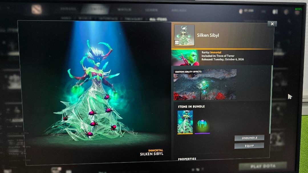 Dota 2 Silken Sibyl Bundle Immortal (Category: In-Game Products) located in Binan City. Submitted by Roj_Vizcarra07 (Listing ID 1469112533, Image 1). Description: - Item: Silken Sibyl Bundle - Event: Trove of terror 2026 - Includes: Immortal cosmetic set with custom ability effects - Delivery: Standard digital item transfer via Steam friend exchange - Status: Giftable or tradeable per Dota 2 event rules.