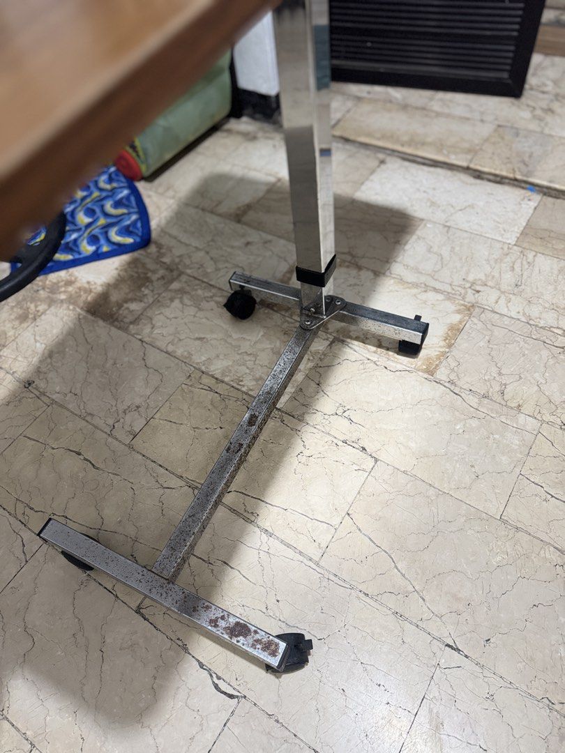 Drive Medical Overbed Table with Wheels (Category: Medical Supplies & Tools) located in Quezon City. Submitted by chi__028 (Listing ID 1468985368, Image 2). Description: - Features: Height-adjustable stem and smooth-rolling casters on an H-style base - Materials: Wood-grain top and durable chrome steel base - Condition: Fully functional and sturdy - Ideal Use: Great bedside table for meals, reading, or laptop use.