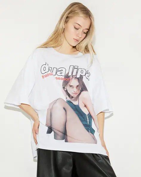 DUA LIPA Training Season Basic white oversized round neck cotton tee too shirt (Category: Shirts) located in Makati City. Submitted by closetsquad (Listing ID 1469103128, Image 1). Description: ☀️BRAND NEW! Never worn! 🏝️Measurements posted; NO when worn 🪸Discounts if buying 2 or more items! 🧜🏻‍♀️RFS: Need funds for my cat 🌺 NO returns/NO refunds/NO swaps 💸 MOP: BPI/GCASH only 🚚 SF: 95 MM/120 GMM & LUZ/150 VISMIN 🛵 NO picking of courier/r
