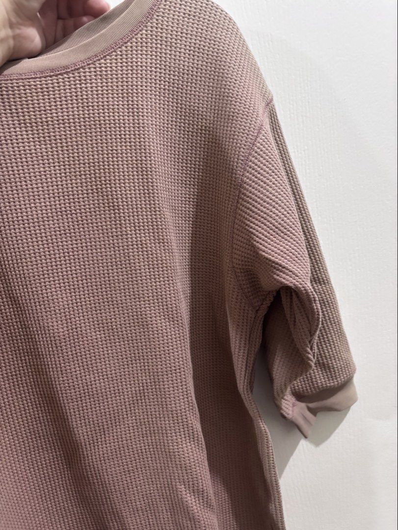 Dusty Pink Waffle Knit Sweater Top (Category: Shirts) located in Caloocan City. Submitted by stuff_shop (Listing ID 1469091317, Image 3). Description: - Color: Dusty pink - Material: Super soft thermal waffle knit - Fit: Relaxed, dropped shoulders, hits below the hips - Details: Crew neckline with ribbed collar and cuffs, curved hemline, 3/4 length sleeves - Style: Versatile basic piece, great for cooler weather or layering with jeans and legging