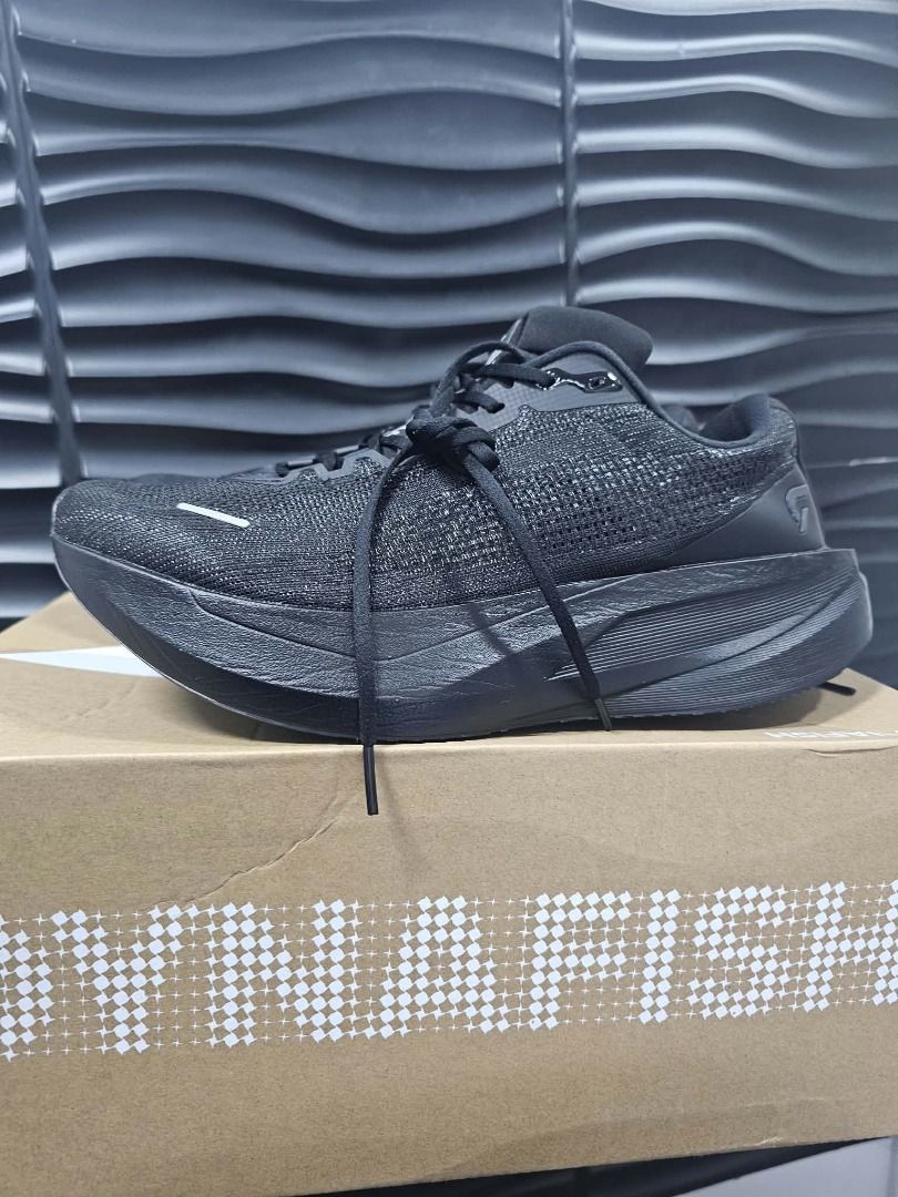 Dynafish Xiaonian (Category: Sneakers) located in Caloocan City. Submitted by freeturtle.a5f464 (Listing ID 1468946436, Image 3). Description: - Color: Black - Style: Athletic slip-on sneakers - Upper: Breathable knit material - Outsole: Textured black rubber with moderate tread wear and still plenty of good traction - Condition: Clean and well-maintained overall.