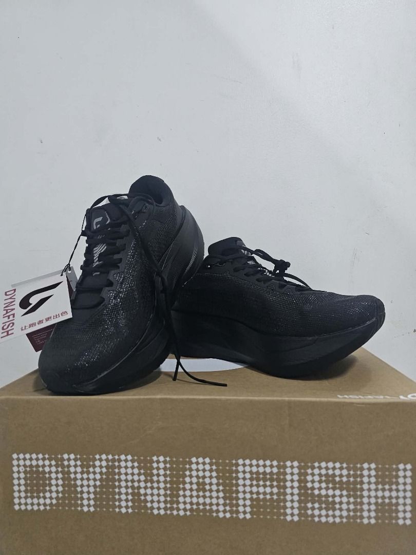 Dynafish Xiaonian (Category: Sneakers) located in Caloocan City. Submitted by freeturtle.a5f464 (Listing ID 1468946436, Image 1). Description: - Color: Black - Style: Athletic slip-on sneakers - Upper: Breathable knit material - Outsole: Textured black rubber with moderate tread wear and still plenty of good traction - Condition: Clean and well-maintained overall.