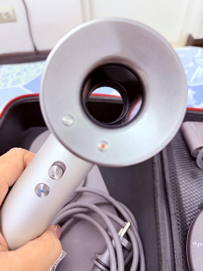 Dyson Hair Dryer HD01 (Category: Hair Accessories) located in Manila. Submitted by yangbracs (Listing ID 1469109351, Image 3). Description: Dyson Hair Dryer HD01 White/Silver No issue No box With bag and manuals Loc Paranaque.