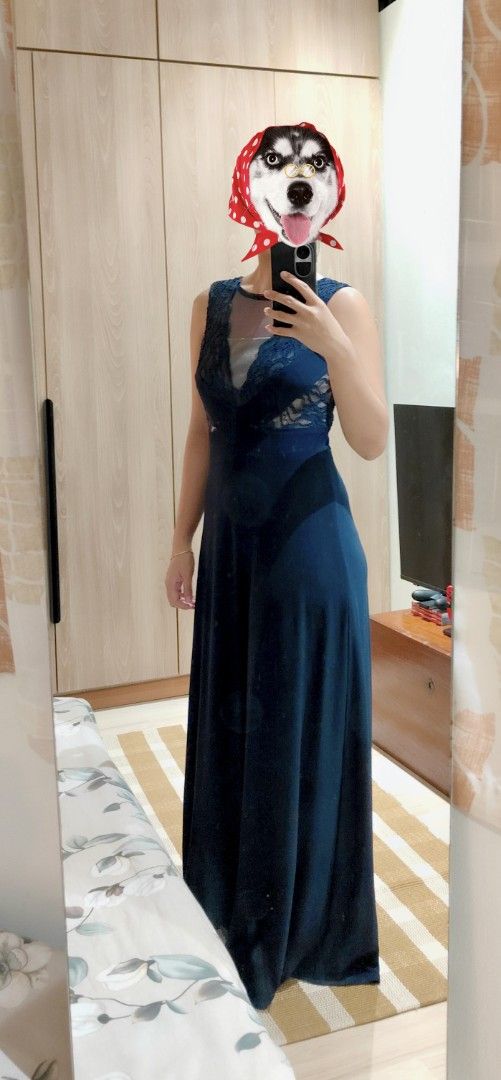 Elegant Deep Navy Blue Lace Evening Gown (Category: Evening dresses & gowns) located in Pasig City. Submitted by iammkds (Listing ID 1469158921, Image 2). Description: Size: Fits Small (S) ***For reference: I am 5'3" tall and weigh 50 kg. Condition: Good as new (Worn once only, no flaws) Style: Sleeveless lace bodice gown with sheer mesh neck & back detail MOP: GCash / Bank Transfer (BPI) MOD: J&T / Lalamove / Grab.
