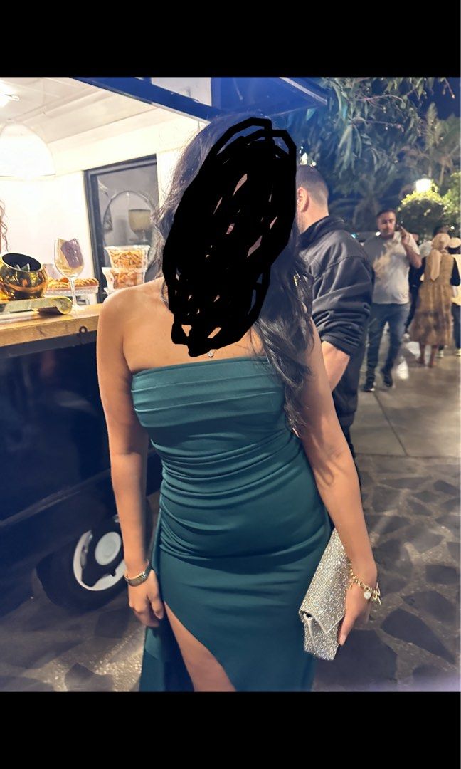 Emerald Green Bridesmaid Dress (Category: Dresses) located in Quezon City. Submitted by shop.marga (Listing ID 1469107496, Image 2). Description: - Color: EmeraldGreen - Style: Floor-length tube dress with ruched bodice and high side slit on the right leg - Fit: Snug, curve-hugging silhouette, super comfy - Condition: Great, worn only once, no stains or pulls - Perfect for: Night outs and special events, weddings For reference I’m 5’1” wearing 3i