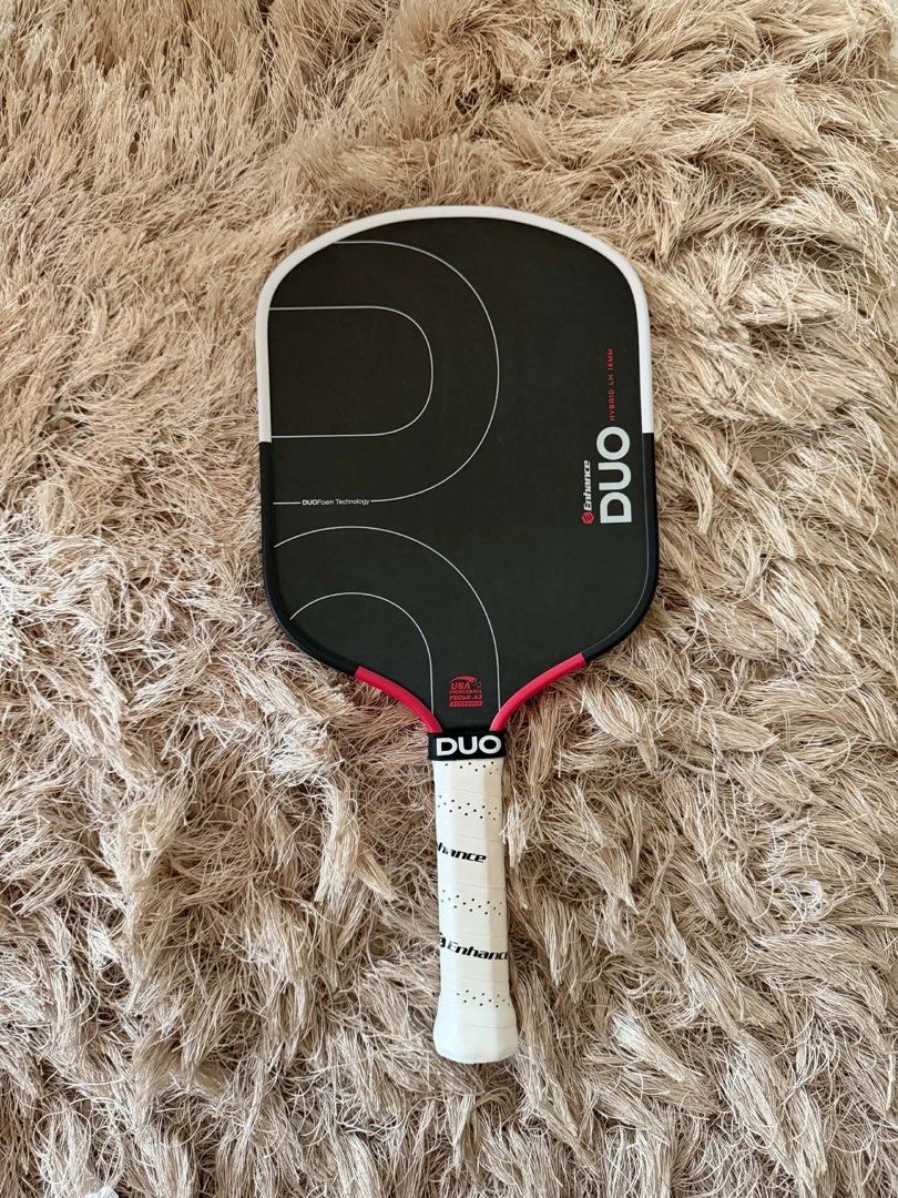 Enhance Duo Hybrid Pickleball Paddle (Category: Racket and Ball Sports) located in Taguig. Submitted by holyshx (Listing ID 1469068701, Image 2). Description: For Sale: Enhancer Duo Hybrid LH 16mm Pickleball Paddle - Condition: Brand new - 16 MM Hybrid - Includes free grip - Price still negotiable for sure buyer JNT/LBC MOP: Gcash/BPI/Unionbank Loc: Isabela RFS: Extra paddle and barely used .
