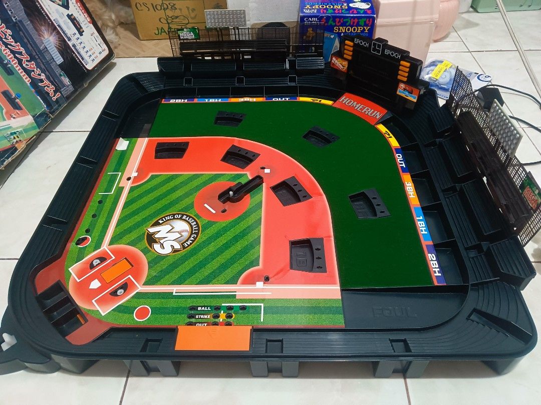 Epoch Baseball Game MS Mega Slugger Stadium Toy (Category: Action & Battle Toys) located in Manila. Submitted by mateochest99469 (Listing ID 1469097427, Image 3). Description: - Model: Epoch MS Mega Slugger Tabletop Baseball Game - Big stadium layout measuring 600 x 600mm for realistic gameplay - Features a working electronic scoreboard display - Equipped with dual pitch levers and outfield stands - Original box included, great for collectors and