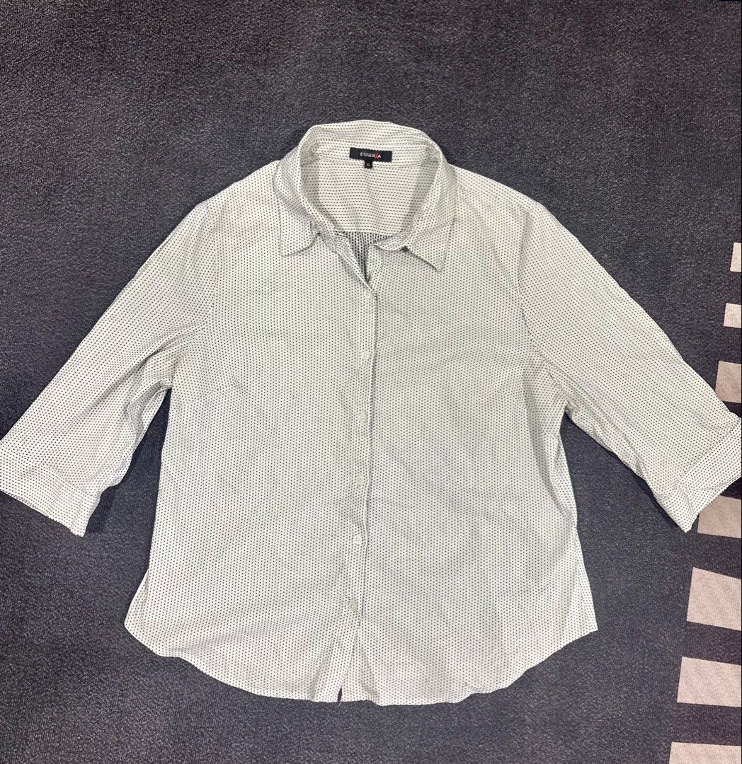 Essenx A White Black Dot Long Sleeve Button Up Blouse XL (Category: Longsleeves) located in Quezon City. Submitted by fast.closetfinds (Listing ID 1469021777, Image 2). Description: - Color & Pattern: White with black dots - Size: XL - Design: Classic collar, front button closure, and long sleeves with cuffs - Condition: Excellent / Pre-loved (ready to wear) - Style: Versatile for office work or casual outings - Shipping or meet-up options availa