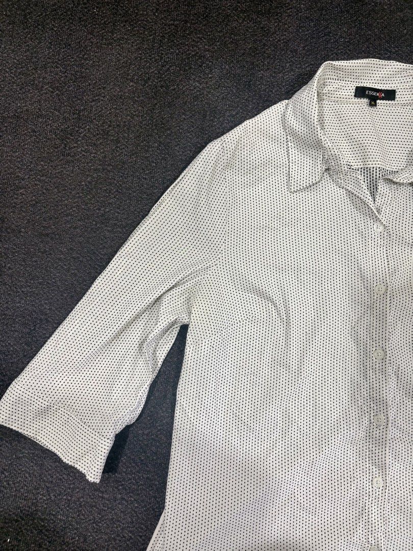 Essenx A White Black Dot Long Sleeve Button Up Blouse XL (Category: Longsleeves) located in Quezon City. Submitted by fast.closetfinds (Listing ID 1469021777, Image 1). Description: - Color & Pattern: White with black dots - Size: XL - Design: Classic collar, front button closure, and long sleeves with cuffs - Condition: Excellent / Pre-loved (ready to wear) - Style: Versatile for office work or casual outings - Shipping or meet-up options availa