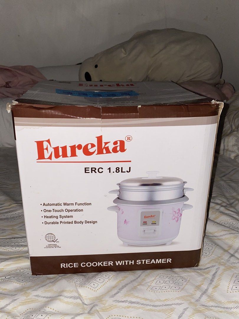 Eureka ERC 1.8LJ Rice Cooker with Steamer (Category: Cookers) located in Manila. Submitted by ssarskie (Listing ID 1469036715, Image 3). Description: - Brand new, never used Eureka rice cooker (1.8L capacity) - Charming white body with pink floral and butterfly print - Easy one-touch operation with automatic warm function - Includes original box, inner pot, and steamer attachment (all in original plastic wrappers) - Perfect for daily cooking and 