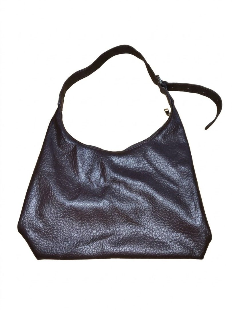 Everyday Essential: Discover the Ultimate Slouchy Leather Bag (Category: Tote Bags) located in Manila. Submitted by vbaykco (Listing ID 1469096089, Image 1). Description: The Essential Espresso Hobo Elevate your everyday style with effortless sophistication. Crafted from rich, textured leather with a soft slouchy silhouette, this versatile shoulder bag features a sleek adjustable buckle strap and a spacious interior for all your essentials. Perfe