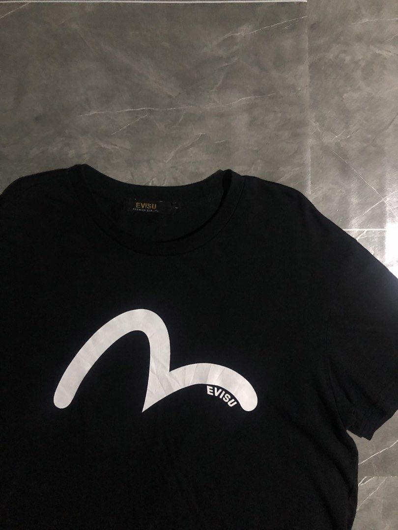 Evisu BigLogo tee (Category: Activewear) located in Manila. Submitted by buksthrifthing (Listing ID 1469158455, Image 3). Description: 22 by 27.5 Medium to semi large No issue 9.5/10 collor rate .