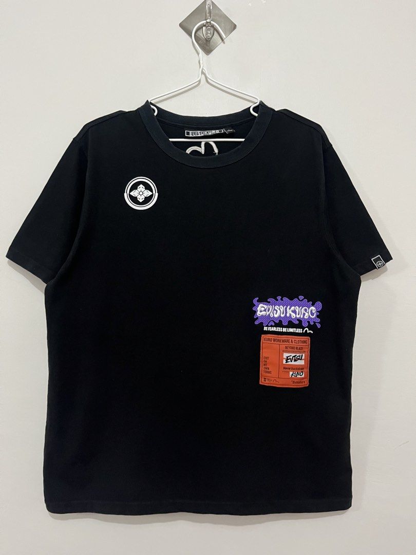 Evisu Liquidfied Logo Label T-Shirt (Category: Tshirts & Polo Shirts ) located in Daet. Submitted by rens.finds (Listing ID 1469113164, Image 1). Description: - Brand: Evisu - Condition: 9/10 - Issue: ❌ - Color Rate: 9.5/10 - Length x Width ( 26.5x 22 ) “Actual product color may vary due to lighting.” ⬅️ Swipe For More Details .