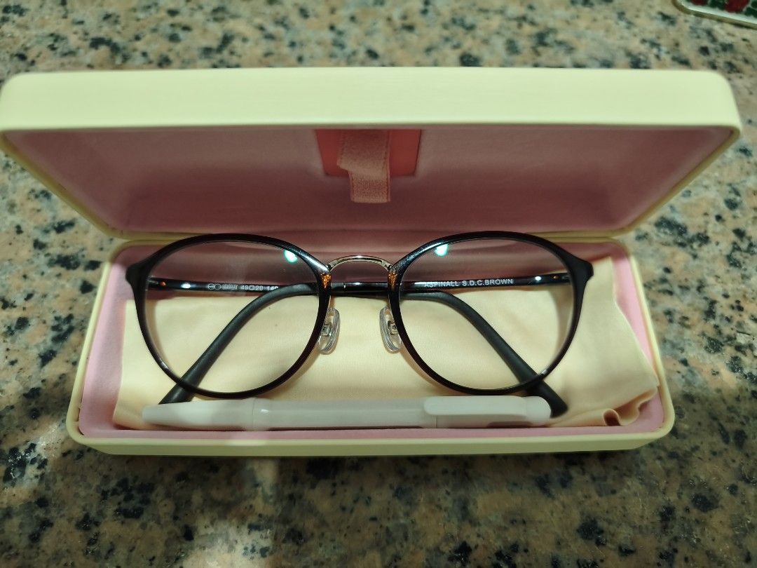 Executive Optical Aspinal S.D.C. Brown Eyeglasses Frames (Category: Sunglasses & Eyewear) located in Paranaque City. Submitted by airico (Listing ID 1469093252, Image 1). Description: - Brand/Model: Executive Optical - Aspinal S.D.C. Brown - Color/Design: Brown oval rims with stylish gold-tone bridge and temples - Provenance: Originally purchased from SM City BF Parañaque last August 2026 - Inclusions: Complete with hard storage case, cleaning cl