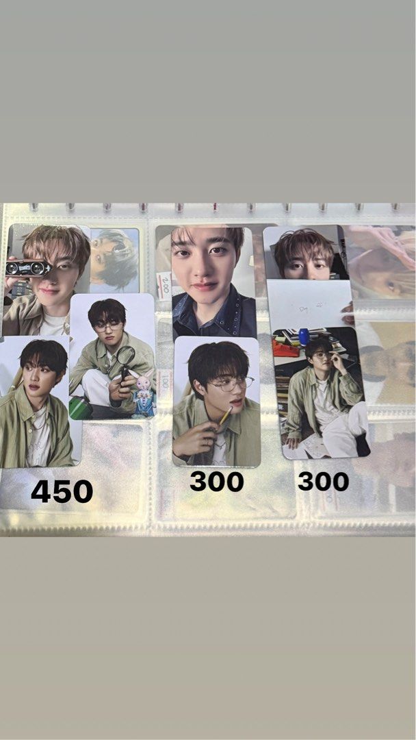EXO D.O. Photocard Collection Set (Category: K-Wave Merchandise) located in Manila. Submitted by sabdandayi17498 (Listing ID 1469062102, Image 1). Description: - Item: D.O. Photocards / Inclusions - Prices: 450 and 300 (indicated on sleeves) - Condition: Mint, kept in binder sleeves since pulling - Environment: Smoke-free home - Note: Message for individual availability or bundle deals.